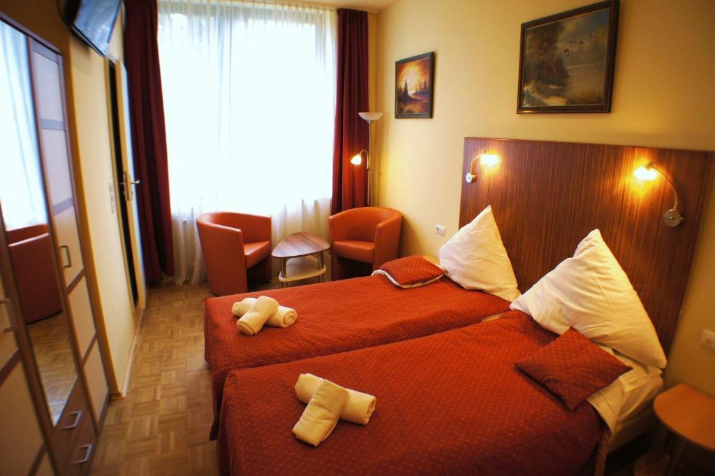 City Hotel MHG Rum bild